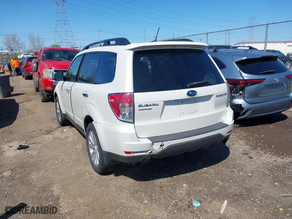 2011 Subaru Forester 2.5X Limited with VIN JF2SHBEC7BH778799, listed as a IAAI auction lot 41973395 with 216,944 mi miles. Bid and sale history available at carsss.com. Image 3.