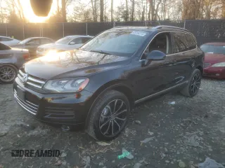 2013 Volkswagen Touareg Lux with VIN WVGEF9BP1DD001025, listed as a Copart auction lot 83784314 with 205,871 mi miles and Salvage Title. Bid and sale history available at DreamBid. Image 1.