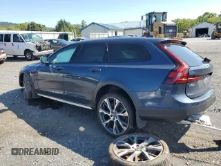 2023 Volvo V90 Ultimate z VIN YV4062NC8P1163218, wystawiony jako Copart lot #69917884 z przebiegiem 21 683 mil mil oraz Szkody całkowita. Historia ofert i sprzedaży dostępna na DreamBid. Obrazek 2.
