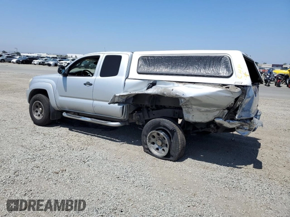 2005 Toyota Tacoma PreRunner with VIN 5TETU62N05Z047131, listed as a Copart auction lot 61256985 with 165,573 mi miles and Salvage title. Bid and sale history available at DreamBid. Image 2.