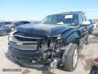 2011 Chevrolet Suburban LTZ with VIN 1GNSCKE03BR117338, listed as a IAAI auction lot 41878479 with 182,327 mi miles. Bid and sale history available at carsss.com. Image 2.