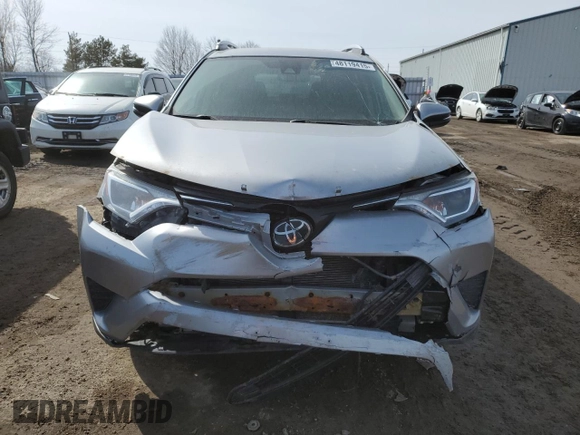 2018 Toyota RAV4 LE with VIN 2T3BFREV9JW754527, listed as a Copart auction lot 48119415 with 217,777 mi miles and Salvage Title. Bid and sale history available at carsss.com. Image 5.