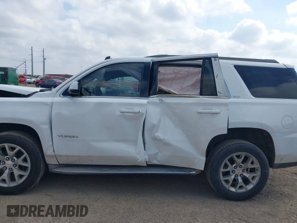 2015 GMC Yukon SLT with VIN 1GKS1BKC6FR109970, listed as a IAAI auction lot 41507467 with 115,309 mi miles. Bid and sale history available at carsss.com. Image 15.