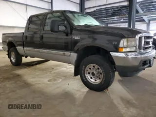 2002 Ford Super Duty F-250 XL with VIN 1FTNW21L02EC99052, listed as a Copart auction lot 76759774 with 84,467 mi miles and Clean Title. Bid and sale history available at carsss.com. Image 4.