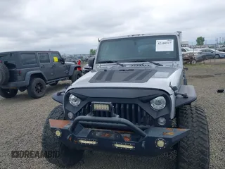 2018 Jeep Wrangler Unlimited Sport S with VIN 1C4BJWDG4JL861052, listed as a IAAI auction lot 42100517 with 43,907 mi miles and . Bid and sale history available at DreamBid. Image 13.