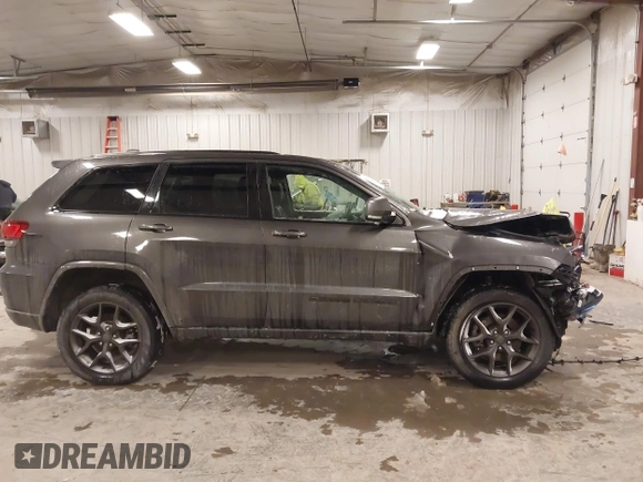 2021 Jeep Grand Cherokee 80th Anniversary z VIN 1C4RJFBG2MC736010, wystawiony jako IAAI lot #41355729 z przebiegiem 45 588 mil mil oraz . Historia ofert i sprzedaży dostępna na DreamBid. Obrazek 13.