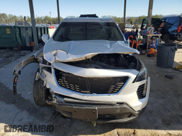 2021 Cadillac XT4 FWD Luxury с VIN 1GYAZAR47MF023407, выставлен на аукционе Copart как лот 88633325 с пробегом 77 353 миль миль и Списание • Salvage title. История ставок и продаж доступна на DreamBid. Изображение 5.