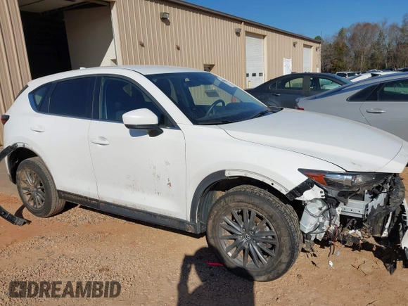 2019 Mazda CX-5 Sport with VIN JM3KFBBM0K0574255, listed as a IAAI auction lot 41661924 with 93,851 mi miles and . Bid and sale history available at DreamBid. Image 13.