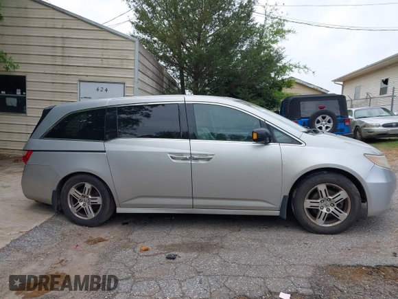 2012 Honda Odyssey Touring with VIN 5FNRL5H95CB101605, listed as a IAAI auction lot 42025163 with 286,421 mi miles. Bid and sale history available at carsss.com. Image 14.