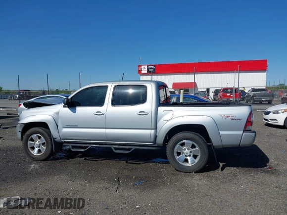 2009 Toyota Tacoma with VIN 3TMLU42N79M034075, listed as a IAAI auction lot 41954016 with 82,399 mi miles and . Bid and sale history available at DreamBid. Image 14.