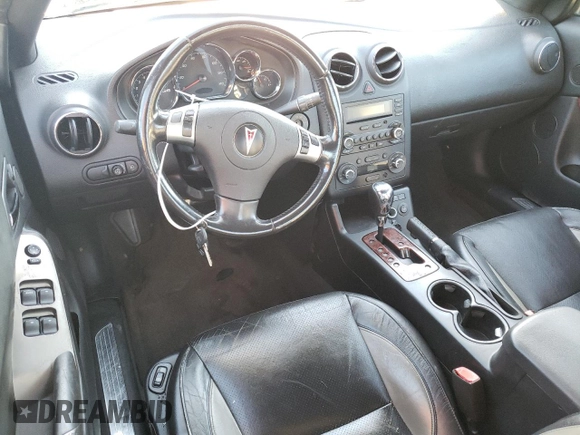 2009 Pontiac G6 GT 1SA z VIN 1G2ZH361294135251, wystawiony jako Copart lot #42901694 z przebiegiem 137 642 mil mil oraz Szkoda całkowita • Salvage title. Historia ofert i sprzedaży dostępna na DreamBid. Obrazek 8.