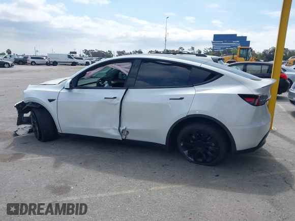 2023 Tesla Model Y Long Range with VIN 7SAYGDEE9PA026005, listed as a IAAI auction lot 41895223 with 43,813 mi miles and . Bid and sale history available at DreamBid. Image 14.