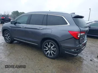 2021 Honda Pilot Touring 8-Passenger with VIN 5FNYF5H9XMB014190, listed as a IAAI auction lot 41749586 with 67,602 mi miles and . Bid and sale history available at DreamBid. Image 3.