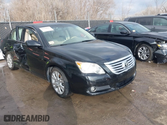 2010 Toyota Avalon XL with VIN 4T1BK3DBXAU357773, listed as a IAAI auction lot 41228045 with 127,403 mi miles and . Bid and sale history available at carsss.com. Image 1.
