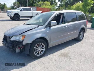 2014 Dodge Grand Caravan SXT with VIN 2C4RDGCG3ER193688, listed as a IAAI auction lot 41290544 with 73,092 mi miles and . Bid and sale history available at DreamBid. Image 18.