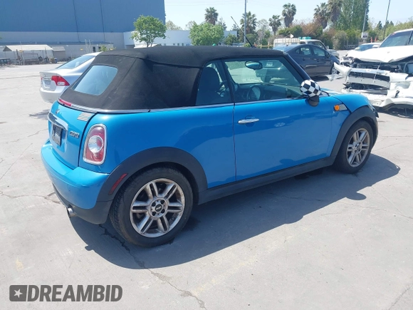 2014 MINI Convertible с VIN WMWZN3C55ET569656, выставлен на аукционе IAAI как лот 42105348 с пробегом 87 671 миль миль и . История ставок и продаж доступна на DreamBid. Изображение 4.