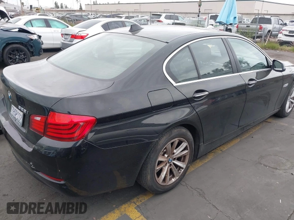 2015 BMW 5 Series 528i with VIN WBA5A5C56FD514814, listed as a IAAI auction lot 42052381 with 76,306 mi miles. Bid and sale history available at carsss.com. Image 4.