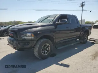 2016 Ram 1500 Rebel z VIN 1C6RR7YT1GS350439, wystawiony jako Copart lot #52300885 z przebiegiem 196 557 mil mil oraz Szkody całkowita. Historia ofert i sprzedaży dostępna na DreamBid. Obrazek 1.
