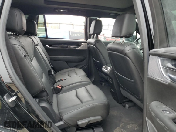 2023 Cadillac XT6 FWD Premium Luxury z VIN 1GYKPCRS5PZ119186, wystawiony jako Copart lot #50577175 z przebiegiem 32 189 mil mil oraz Szkoda całkowita • Salvage title. Historia ofert i sprzedaży dostępna na DreamBid. Obrazek 11.