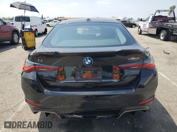 2024 BMW i4 M50 with VIN WBY33AW09RFS37404, listed as a Copart auction lot 51594984 with 776 mi miles and Salvage Title. Bid and sale history available at carsss.com. Image 6.