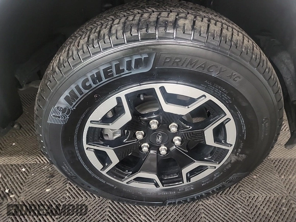 2023 Ford F-150 Lightning Pro z VIN 1FTVW1EL0PWG02840, wystawiony jako IAAI lot #42379448 z przebiegiem 52 710 mil mil oraz . Historia ofert i sprzedaży dostępna na DreamBid. Obrazek 40.