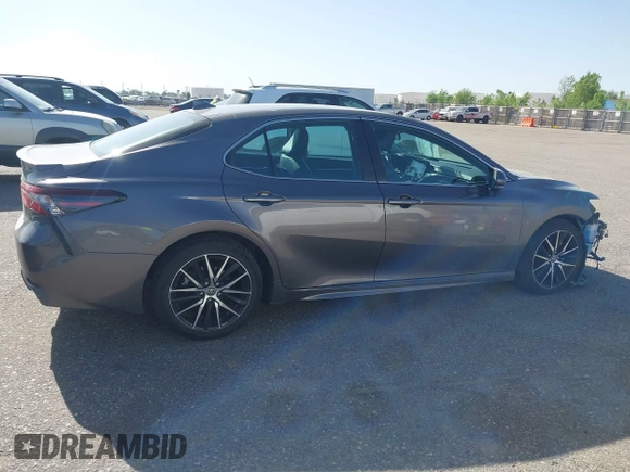 2023 Toyota Camry SE with VIN 4T1G11AK5PU163629, listed as a IAAI auction lot 42262131 with 47,617 mi miles and . Bid and sale history available at DreamBid. Image 14.