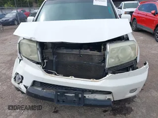 2009 Honda Pilot Touring with VIN 5FNYF48929B032510, listed as a IAAI auction lot 41945923 with 236,256 mi miles and . Bid and sale history available at carsss.com. Image 6.