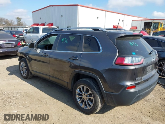 2020 Jeep Cherokee Altitude with VIN 1C4PJLLB5LD580742, listed as a IAAI auction lot 41483128 with 77,127 mi miles. Bid and sale history available at carsss.com. Image 3.