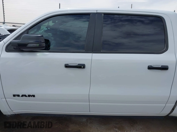 2023 Ram 1500 Limited with VIN 1C6SRFHT5PN576378, listed as a IAAI auction lot 42253096 with 41,802 mi miles and . Bid and sale history available at DreamBid. Image 13.