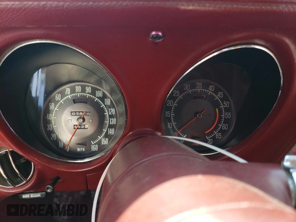 1974 Chevrolet Corvette with VIN 1Z67J4S405054, listed as a Copart auction lot 66356575 with 7,810 mi miles and Salvage title. Bid and sale history available at DreamBid. Image 9.