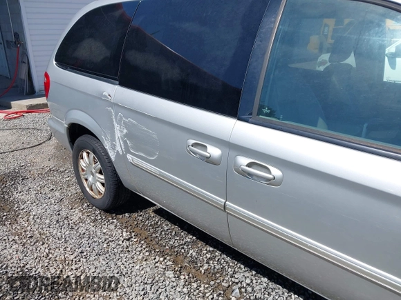 2006 Chrysler Town & Country Touring with VIN 2A4GP54L36R820920, listed as a IAAI auction lot 42335161 with 205,432 mi miles and . Bid and sale history available at DreamBid. Image 6.