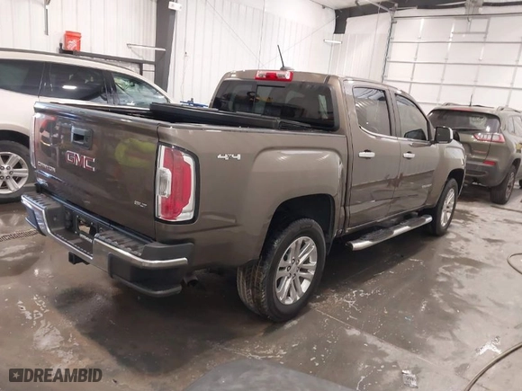 2016 GMC Canyon 4WD SLT with VIN 1GTG6DE33G1162264, listed as a IAAI auction lot 41671097 with 109,956 mi miles. Bid and sale history available at carsss.com. Image 4.