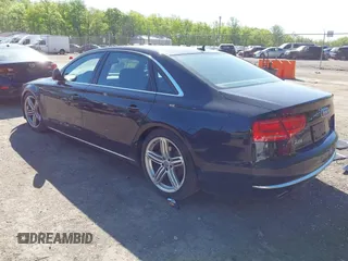 2013 Audi A8 3.0L with VIN WAURGAFD0DN005532, listed as a IAAI auction lot 42113540 with 176,635 mi miles and . Bid and sale history available at DreamBid. Image 3.