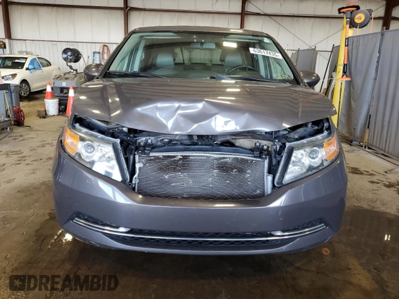 2014 Honda Odyssey EX-L with VIN 5FNRL5H6XEB134849, listed as a Copart auction lot 63617435 with 127,491 mi miles and Salvage title. Bid and sale history available at DreamBid. Image 5.