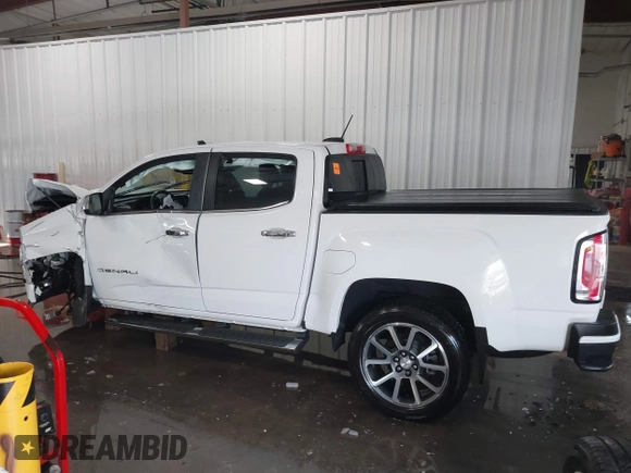 2021 GMC Canyon 4WD Denali with VIN 1GTG6EEN0M1229180, listed as a IAAI auction lot 41298304 with 55,865 mi miles. Bid and sale history available at carsss.com. Image 15.