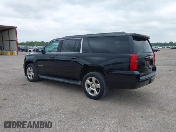 2016 Chevrolet Suburban LT with VIN 1GNSKHKC4GR233059, listed as a IAAI auction lot 42137869 with 115,571 mi miles. Bid and sale history available at carsss.com. Image 3.