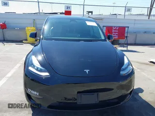 2022 Tesla Model Y Long Range with VIN 7SAYGDEE6NF480471, listed as a IAAI auction lot 41985797 with 82,777 mi miles and . Bid and sale history available at DreamBid. Image 13.