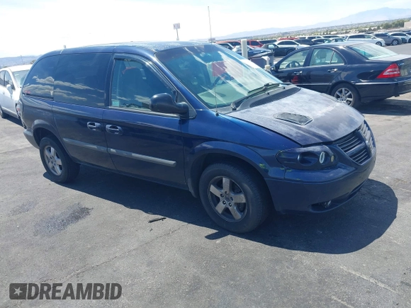 2005 Dodge Caravan SXT with VIN 1D8GP45R65B280660, listed as a IAAI auction lot 42169027 with 246,407 mi miles and . Bid and sale history available at carsss.com. Image 1.