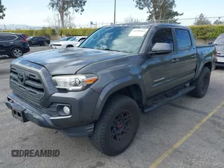 2017 Toyota Tacoma SR5 with VIN 3TMAZ5CN7HM036078, listed as a IAAI auction lot 41698163 with 91,376 mi miles. Bid and sale history available at carsss.com. Image 2.
