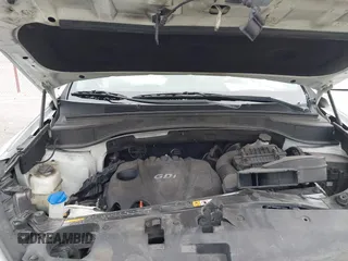 2014 Hyundai Santa Fe with VIN 5XYZU3LB9EG229255, listed as a IAAI auction lot 42407410 with 201,523 mi miles and . Bid and sale history available at DreamBid. Image 10.