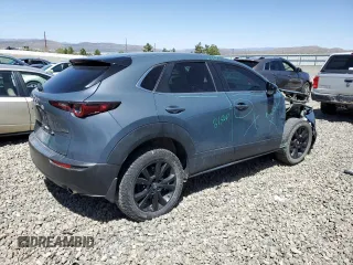 2023 Mazda CX-30 S Carbon Edition with VIN 3MVDMBCM1PM524019, listed as a Copart auction lot 57079355 with 46,737 mi miles and Salvage title. Bid and sale history available at DreamBid. Image 3.