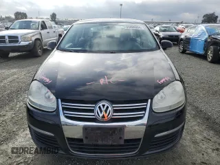 2009 Volkswagen Jetta S с VIN 3VWJZ71K99M049465, выставлен на аукционе Copart как лот 84696904 с пробегом 98 631 миль миль и Списание • Salvage title. История ставок и продаж доступна на DreamBid. Изображение 5.