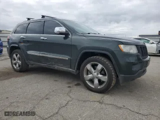 2011 Jeep Grand Cherokee Overland with VIN 1J4RR6GT4BC713527, listed as a Copart auction lot 49399445 with 145,242 mi miles and Salvage Title. Bid and sale history available at carsss.com. Image 4.
