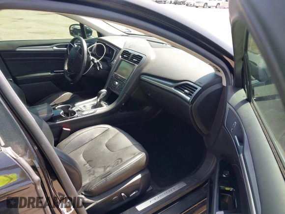 2015 Ford Fusion Titanium with VIN 3FA6P0K91FR168665, listed as a IAAI auction lot 41852403 with 138,711 mi miles. Bid and sale history available at carsss.com. Image 5.