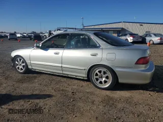 1998 Acura Integra LS with VIN JH4DB7659WS002591, listed as a Copart auction lot 84289584 with 316,458 mi miles and Salvage title. Bid and sale history available at DreamBid. Image 2.