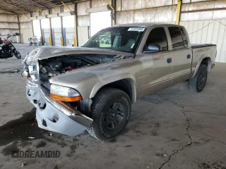 2002 Dodge Dakota SLT z VIN 1B7HL48N42S537026, wystawiony jako Copart lot #53305005 z przebiegiem 175 924 mil mil oraz Szkoda całkowita • Salvage title. Historia ofert i sprzedaży dostępna na DreamBid. Obrazek 1.