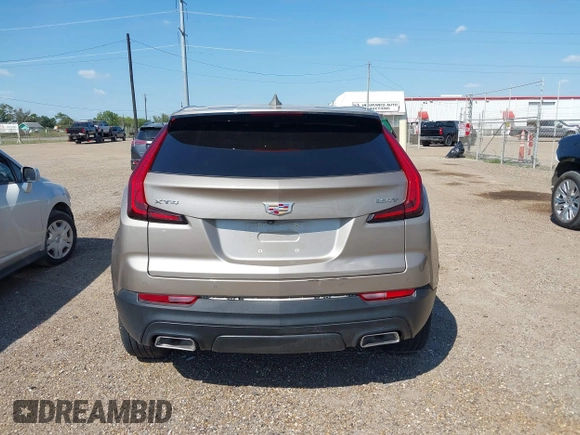 2023 Cadillac XT4 FWD Luxury with VIN 1GYAZAR4XPF116698, listed as a IAAI auction lot 40594015 with 18,368 mi miles. Bid and sale history available at carsss.com. Image 16.