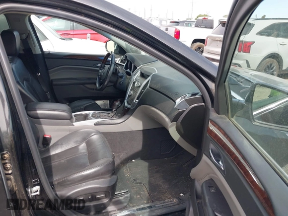 2010 Cadillac SRX Premium Collection with VIN 3GYFNFEY5AS587636, listed as a IAAI auction lot 42243547 with 143,494 mi miles and . Bid and sale history available at DreamBid. Image 5.