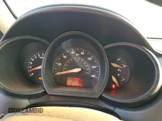2014 Kia Rio EX with VIN KNADN5A34E6325423, listed as a Copart auction lot 69116324 with 104,083 mi miles and Salvage Title. Bid and sale history available at carsss.com. Image 9.