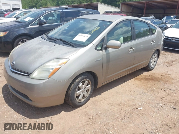 2007 Toyota Prius with VIN JTDKB20U177570088, listed as a IAAI auction lot 42590470 with 151,662 mi miles and . Bid and sale history available at DreamBid. Image 2.